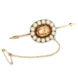 ANTIQUE IMPERIAL TOPAZ AND PEARL BAR BROOCH set with an oval cut topaz in a border of pearls, 5.4cm,