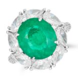 4.33 CARAT EMERALD AND DIAMOND RING set with an oval cut emerald of 4.33 carats in a border of