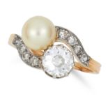 DIAMOND AND PEARL TOI ET MOI RING set with an old cut diamond of approximately 1.00 carats and a