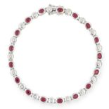 RUBY AND DIAMOND BRACELET set with alternating oval cut rubies and round cut diamonds, 19cm, 17.9g.