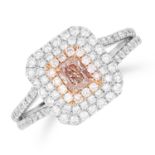 0.36 CARAT FANCY PINK AND WHITE DIAMOND RING set with an oval cushion cut fancy brownish pink