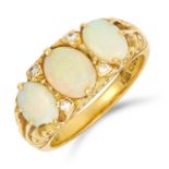 OPAL AND DIAMOND RING set with three graduated oval cabochon opals and round cut diamonds, size