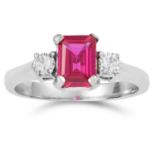 SYNTHETIC RUBY AND DIAMOND RING in 14ct white gold, set with an emerald cut synthetic ruby and two