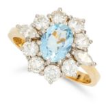 AQUAMARINE AND DIAMOND CLUSTER RING set with an oval cut aquamarine of approximately 1.00 carats and