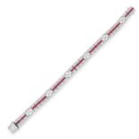 RUBY AND DIAMOND LINE BRACELET set with step cut rubies totalling approximately 3.64 carats and