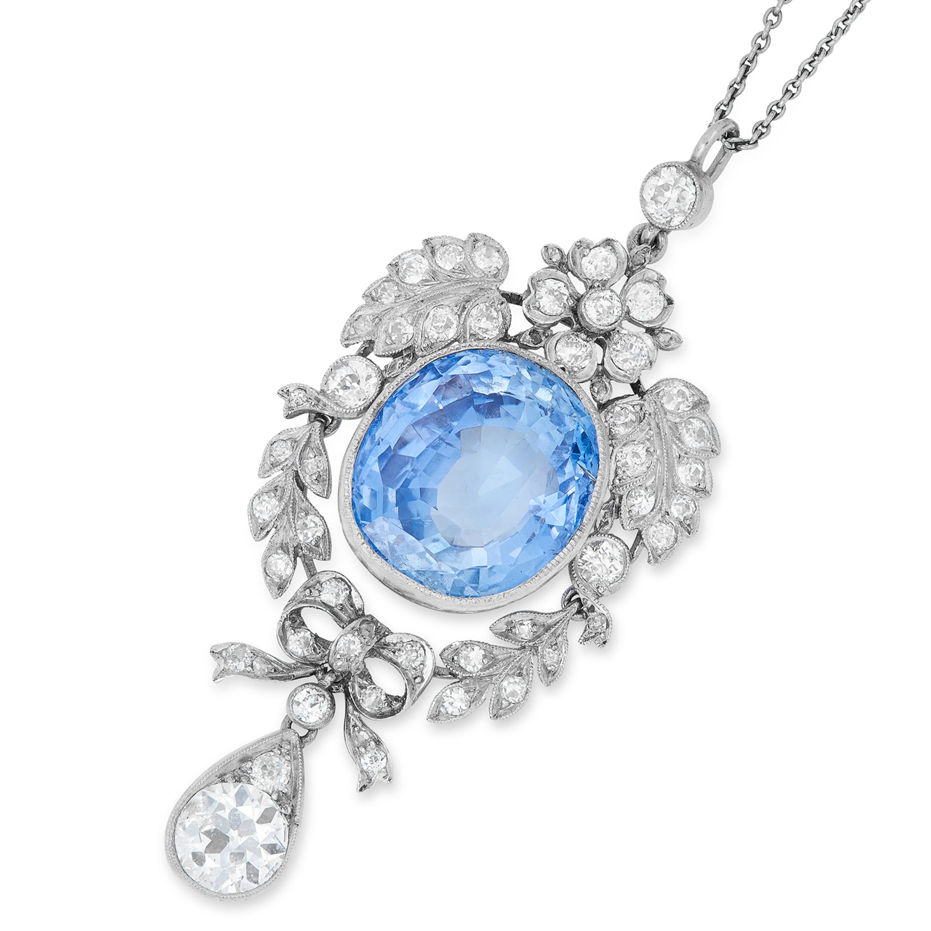 ANTIQUE CEYLON NO HEAT SAPPHIRE AND DIAMOND PENDANT, set with an oval cut sapphire of 18.58 carats
