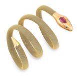 RUBY AND DIAMOND SNAKE BANGLE set with a pear cut ruby and rose cut diamonds, 32.7g.