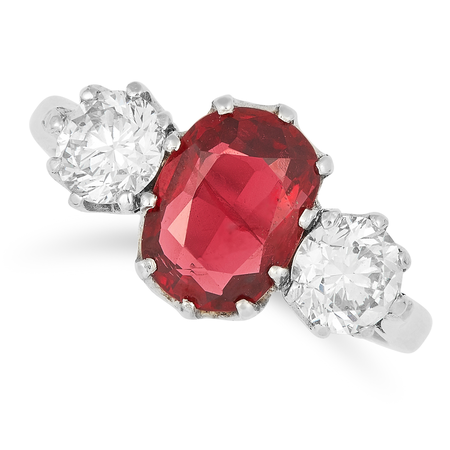 RED SPINEL AND DIAMOND RING set with an oval cut spinel of approximately 1.84 carats between two