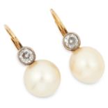 ANTIQUE NATURAL SALTWATER PEARL AND DIAMOND EARRINGS set with an old cut diamond above a natural