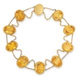 ANTIQUE CITRINE NECKLACE set with nine oval cut citrines suspending belcher link chain swags, 37.