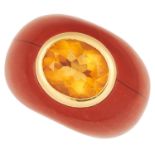 CITRINE AND JASPER DRESS RING comprising of an oval cut citrine set in a band of single piece of