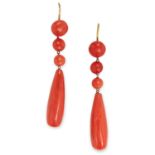 ANTIQUE CORAL DROP EARRINGS, 19TH CENTURY formed of a trio of coral beads suspending polished