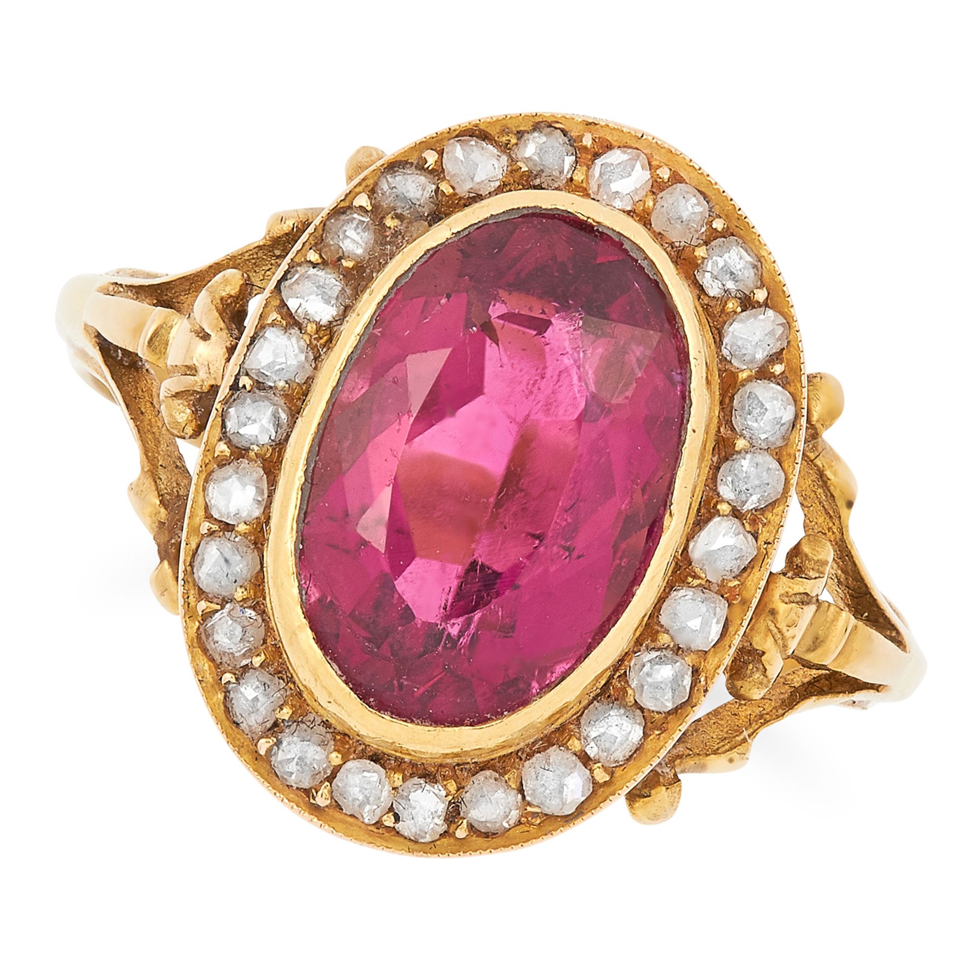 ANTIQUE TOURMALINE AND DIAMOND CLUSTER RING set with an oval cut tourmaline in a border of rose