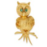 OWL ON A PERCH BROOCH set with round cut emerald eyes, 4cm, 12.7g.
