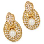 VINTAGE PEARL AND DIAMOND EARRINGS each set with a pearl in a border of round cut diamonds, 2.8cm,