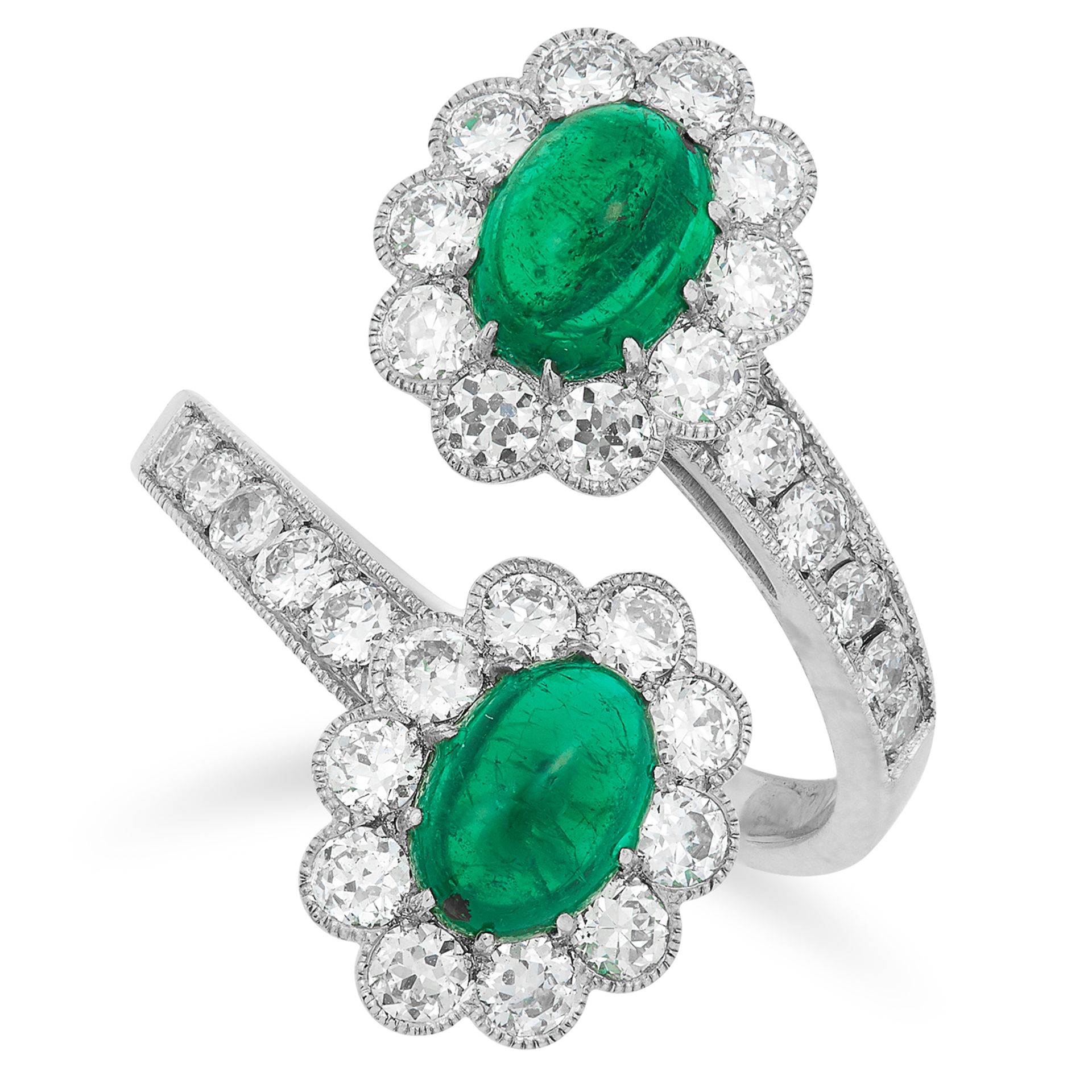 EMERALD AND DIAMOND TOI ET MOI RING set with cabochon emeralds totalling approximately 2.10 carats