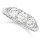 1.29 CARAT THREE STONE RING set with three round cut diamonds, size M / 6, 4.4g.