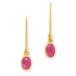 RUBY DROP EARRINGS each set with an oval cut ruby, 2.4cm, 1g.