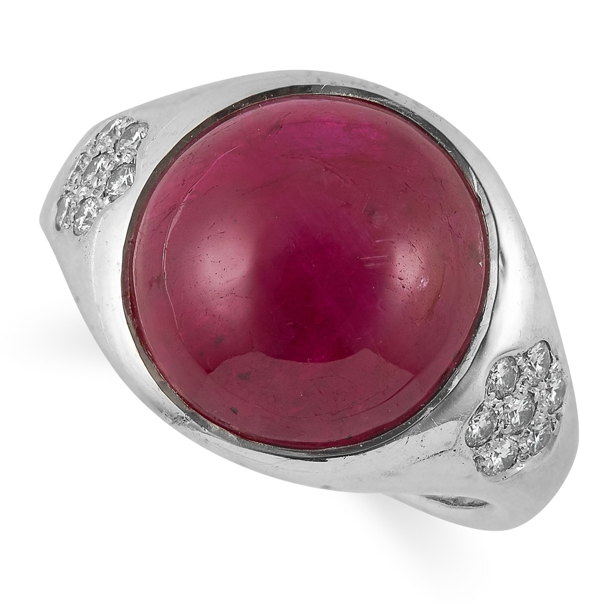 7.00 CARAT BURMA NO HEAT RUBY AND DIAMOND RING set with a cabochon ruby of 7.00 carats between round