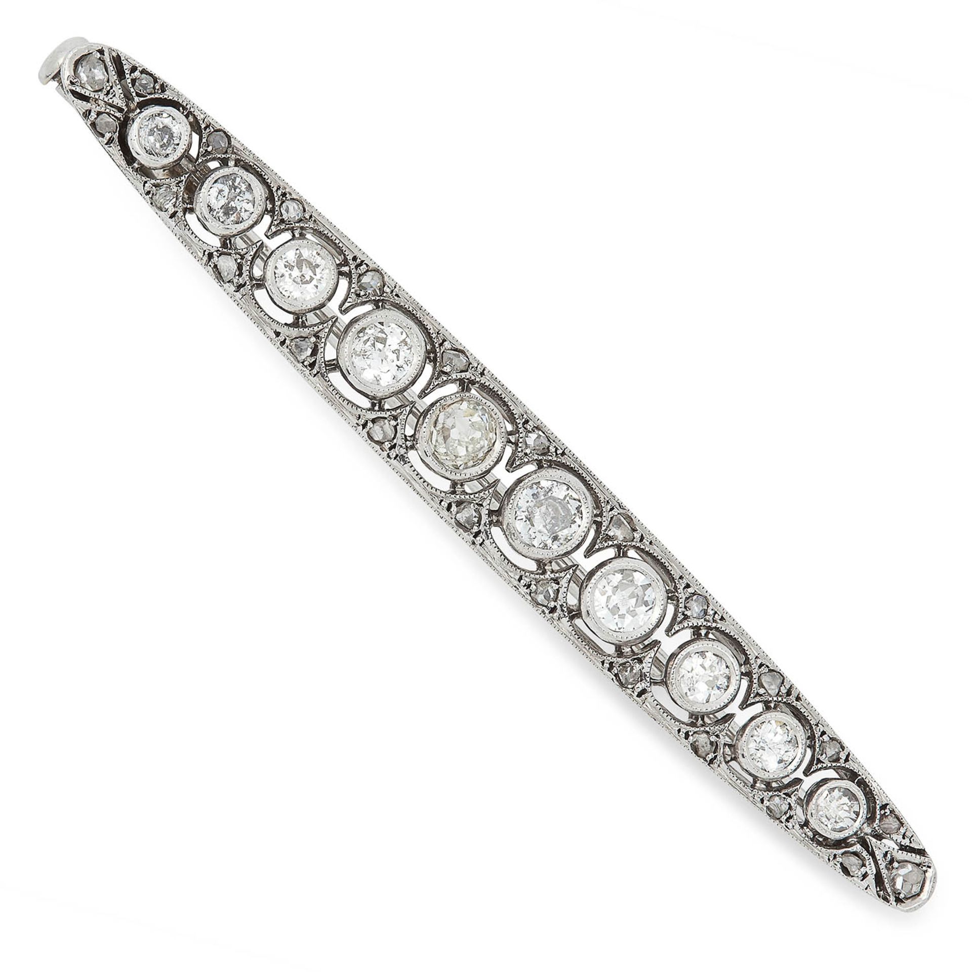 DIAMOND BAR BROOCH set with round cut diamonds and diamond sparks, 5.2cm, 4.9g.