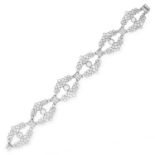 ANTIQUE DIAMOND BRACELET in foliate design set with old cut diamonds totalling approximately 15.78