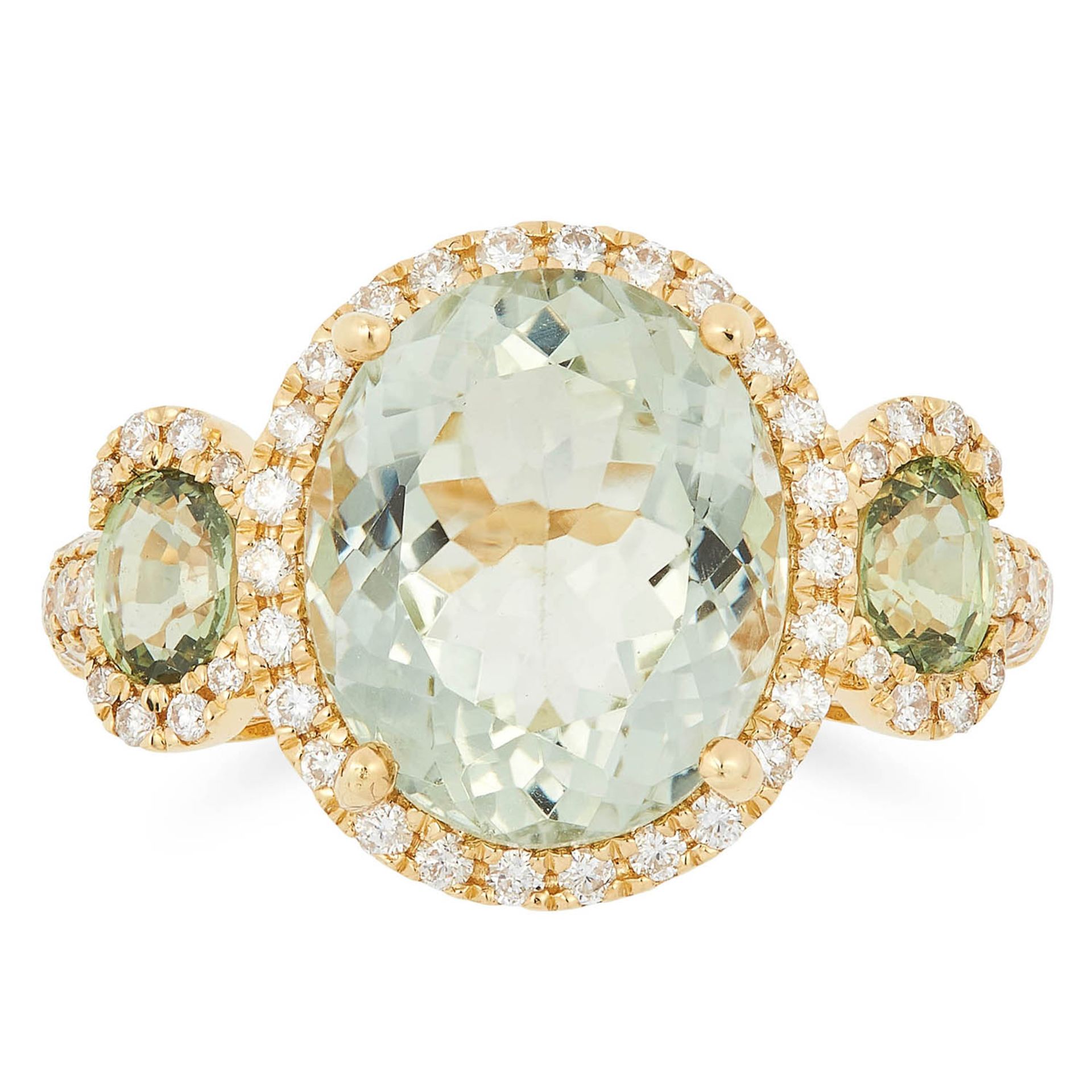 GREEN AMETHYST AND DIAMOND RING set with three oval cut green amethyst in a border of round cut