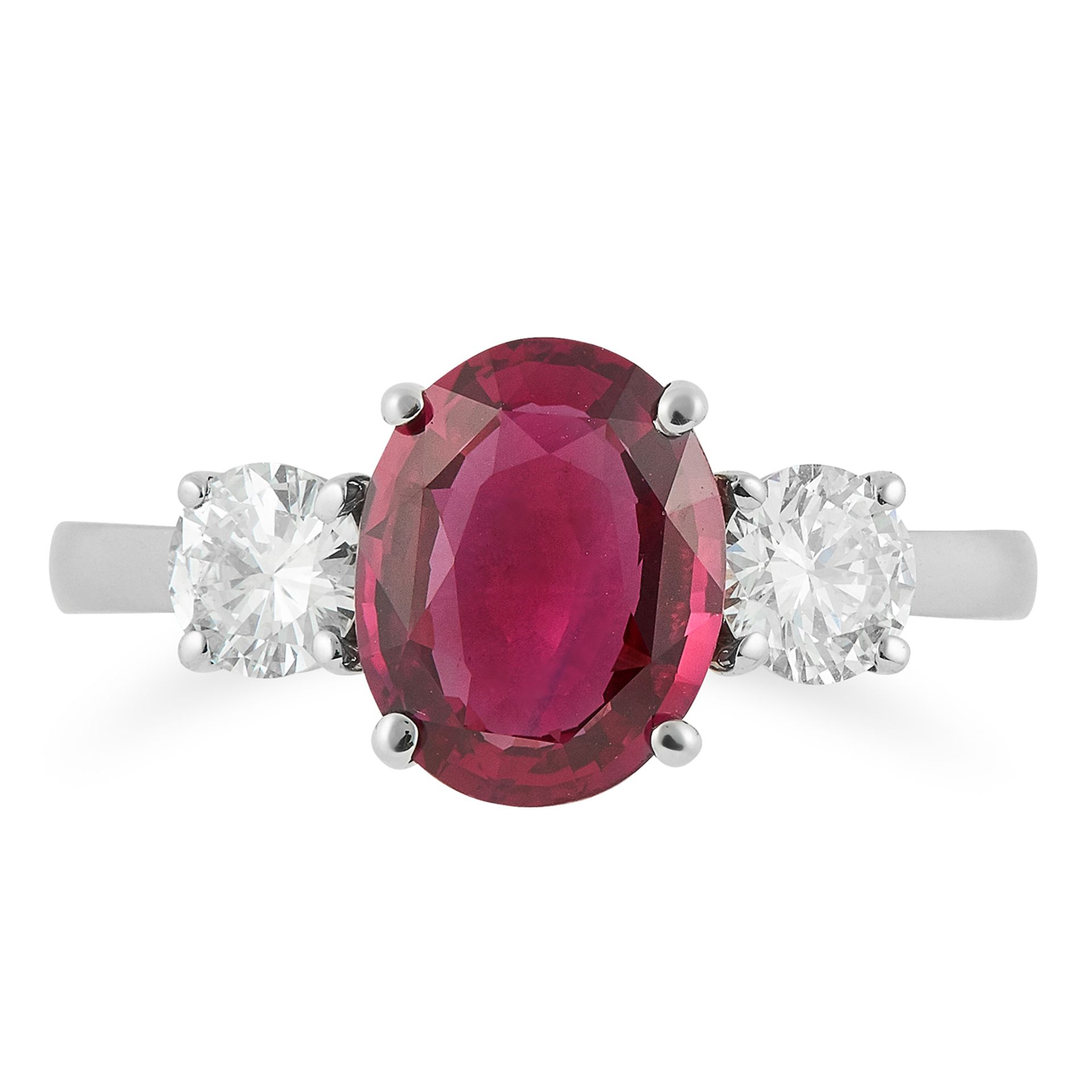 THAI RUBY AND DIAMOND THREE STONE RING set with an oval cut ruby and round cut diamonds, size N / 6,