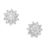 0.98 CARAT DIAMOND STUD EARRINGS each set with a cluster of round cut diamonds, 2.9g.