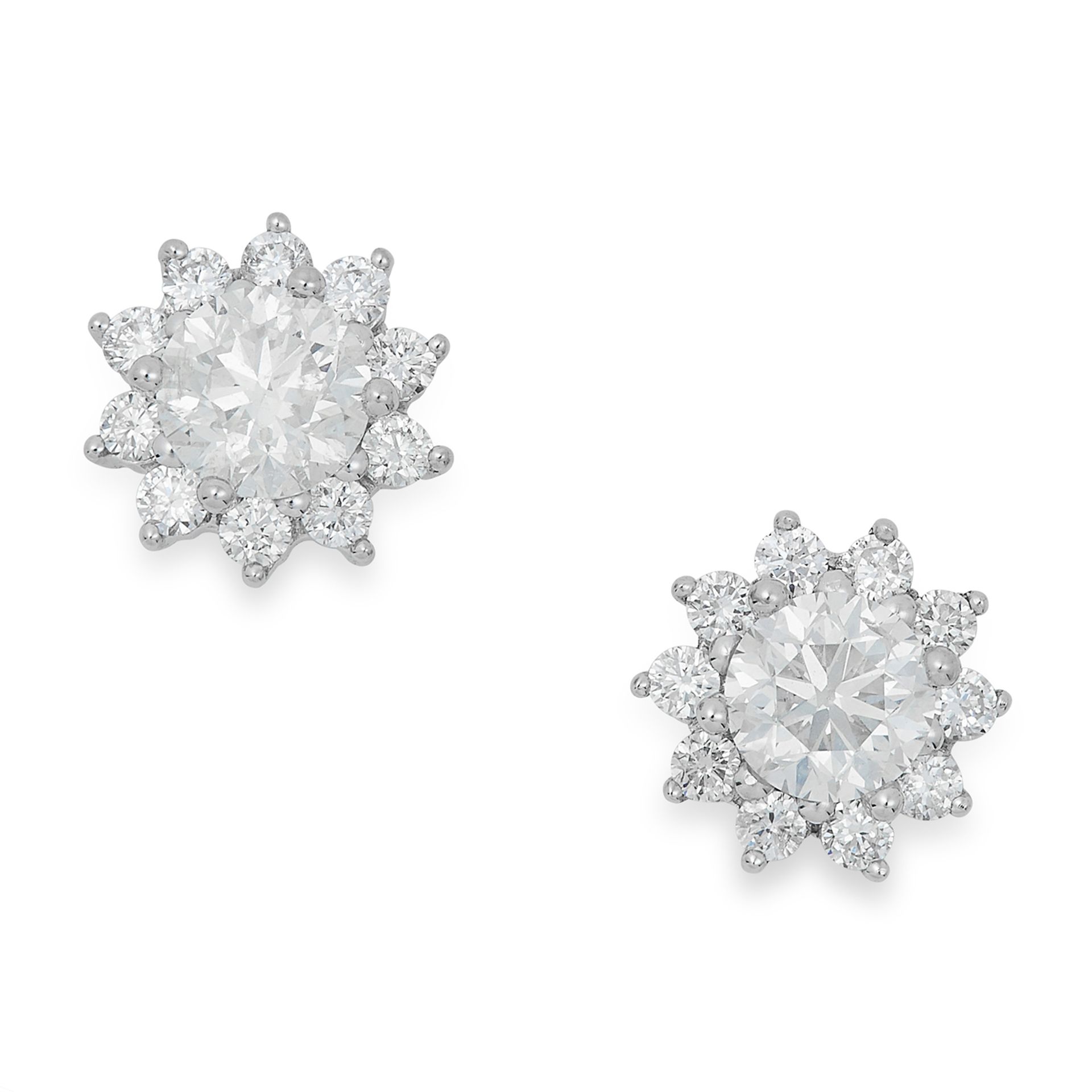 0.98 CARAT DIAMOND STUD EARRINGS each set with a cluster of round cut diamonds, 2.9g.