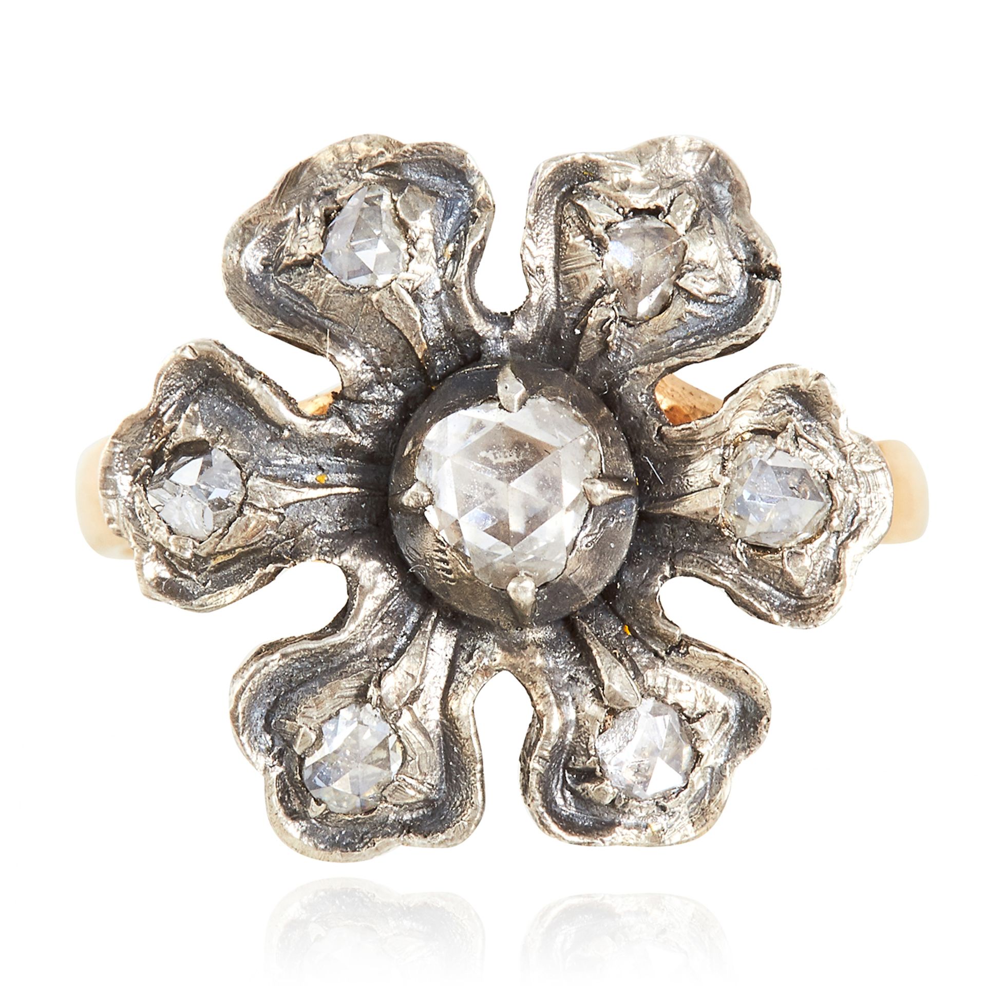 A DIAMOND RING depicting a flower set with rose cut diamonds, 4.52g.