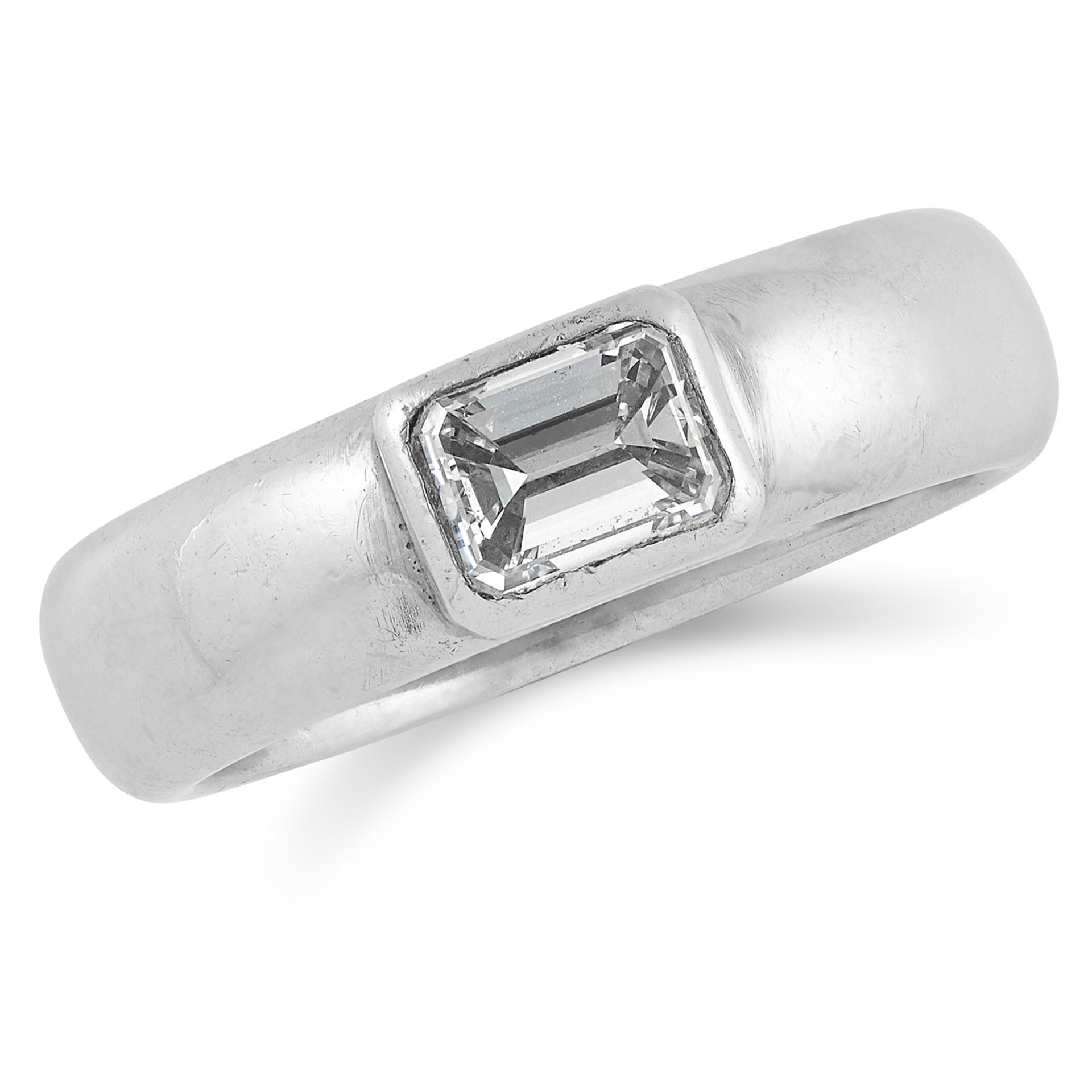 DIAMOND DRESS RING set with an emerald cut diamond, size: O / 7, 13.5g.