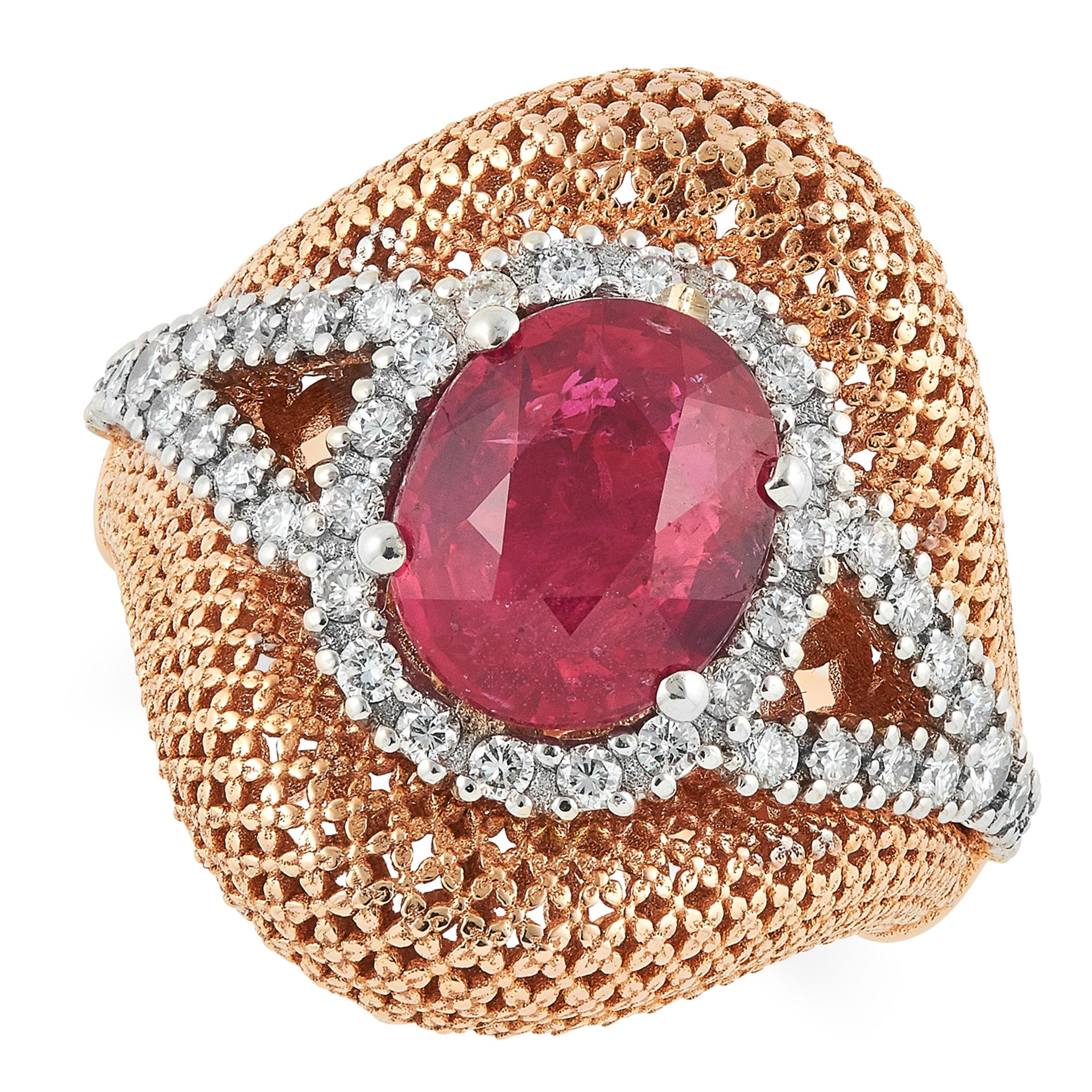 3.19 RUBY AND DIAMOND RING set with an oval cut ruby and round cut diamonds, size N / 6, 9.2g.