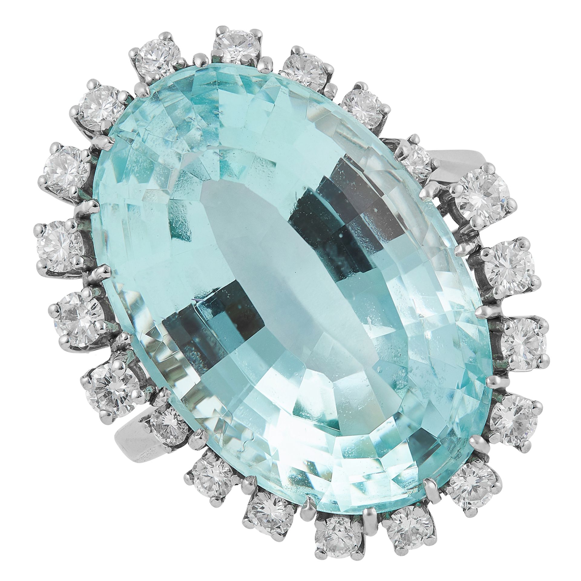 AQUAMARINE AND DIAMOND CLUSTER RING set with an oval cut aquamarine in border of round cut diamonds,