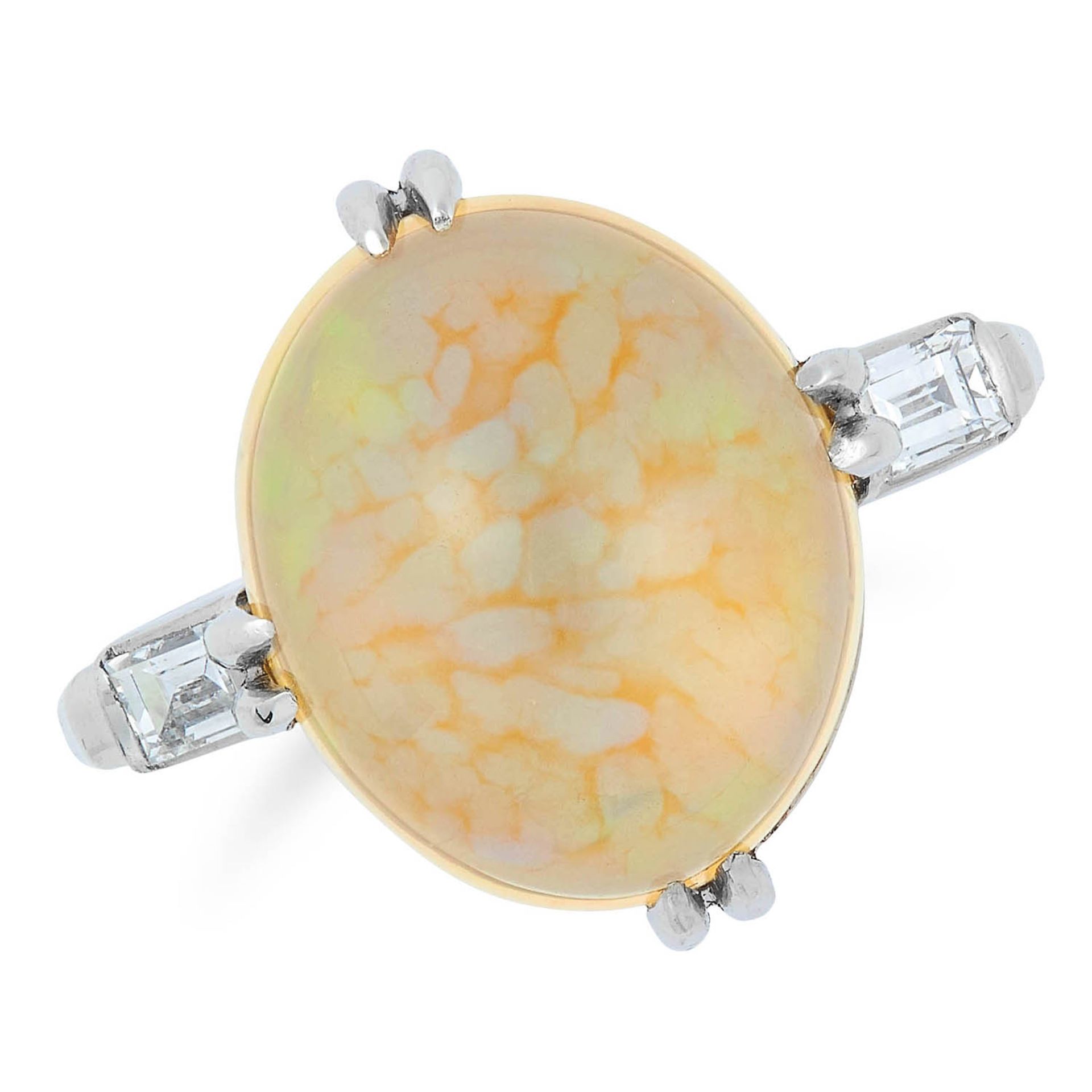OPAL AND DIAMOND RING set with a cabochon opal between two baguette cut diamonds, size O / 7, 6g.