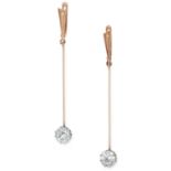 A PAIR OF DIAMOND DROP EARRINGS each comprising of a gold bar suspending an old European cut diamond