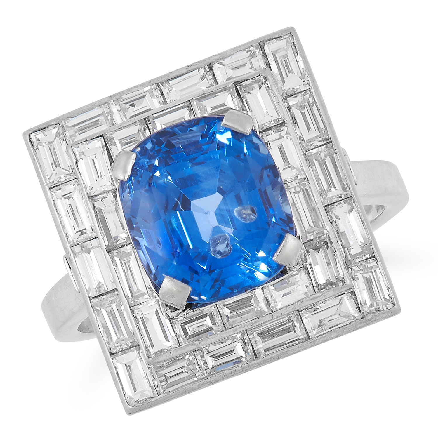 A SAPPHIRE AND DIAMOND DRESS RING set with a cushion cut sapphire of 5.82 carats, surrounded by