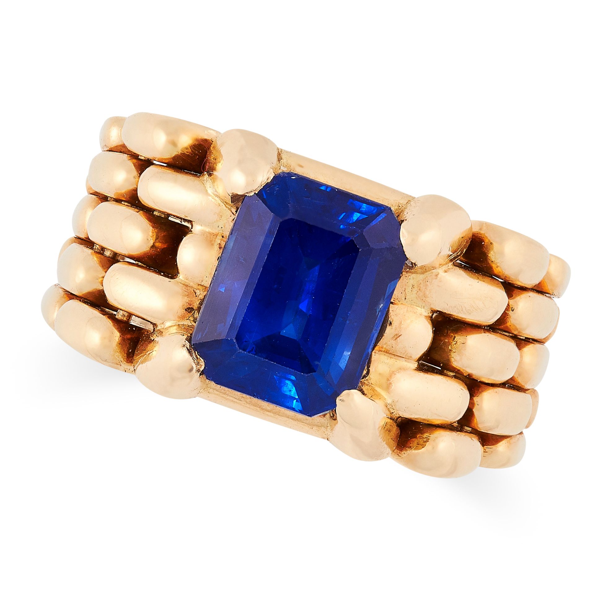 A VINTAGE SAPPHIRE RING comprising of an emerald cut sapphire of 4.70 carats in an articulated