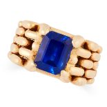 A VINTAGE SAPPHIRE RING comprising of an emerald cut sapphire of 4.70 carats in an articulated