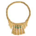 AN EMERALD NECKLACE, CHARLES DE TEMPLE 1973 formed of a fringe of graduated textured gold links, the