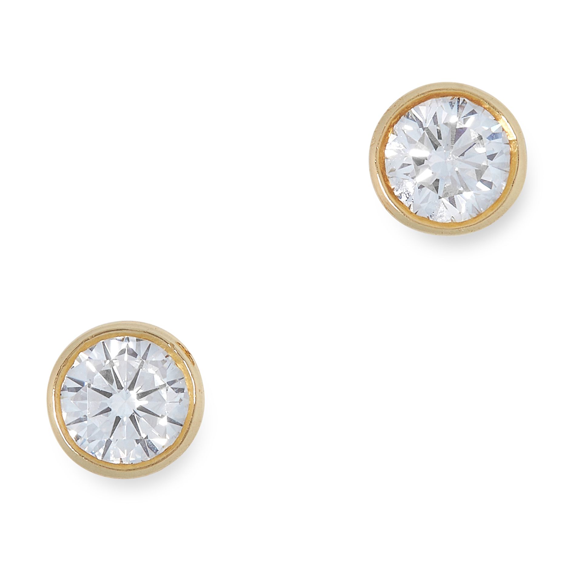 A PAIR OF DIAMOND STUD EARRINGS, BOODLES each set with a round cut diamond, totalling 0.90 carats,