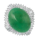 A JADEITE JADE AND DIAMOND RING set with an oval jadeite cabochon of 20.68 carats within a ballerina