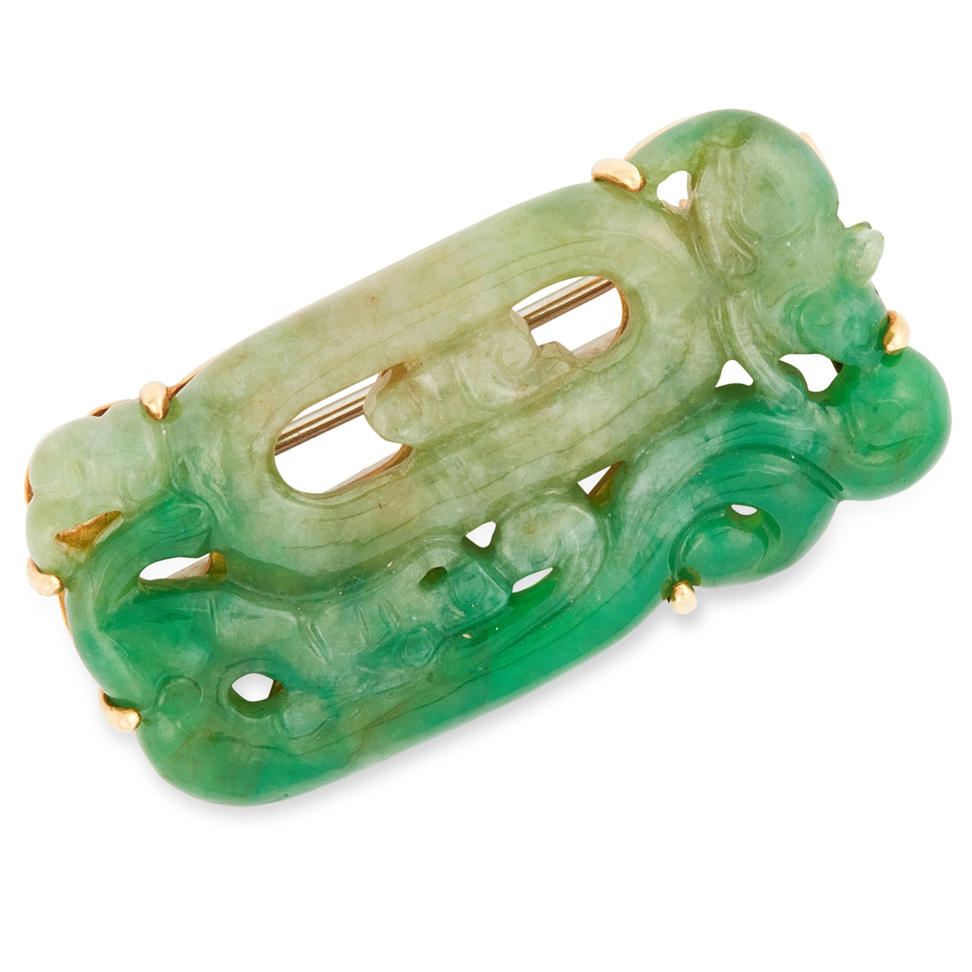 A CARVED CHINESE JADEITE JADE BROOCH formed of a carved piece of jadeite depicting oriental