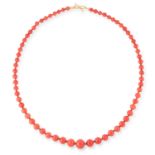 A CORAL AND DIAMOND NECKLACE comprising a single row of sixty-six graduated round coral beads