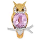 A KUNZITE, DIAMOND AND ONYX OWL BROOCH, 1975 designed as an owl, set with an oval cut kunzite of