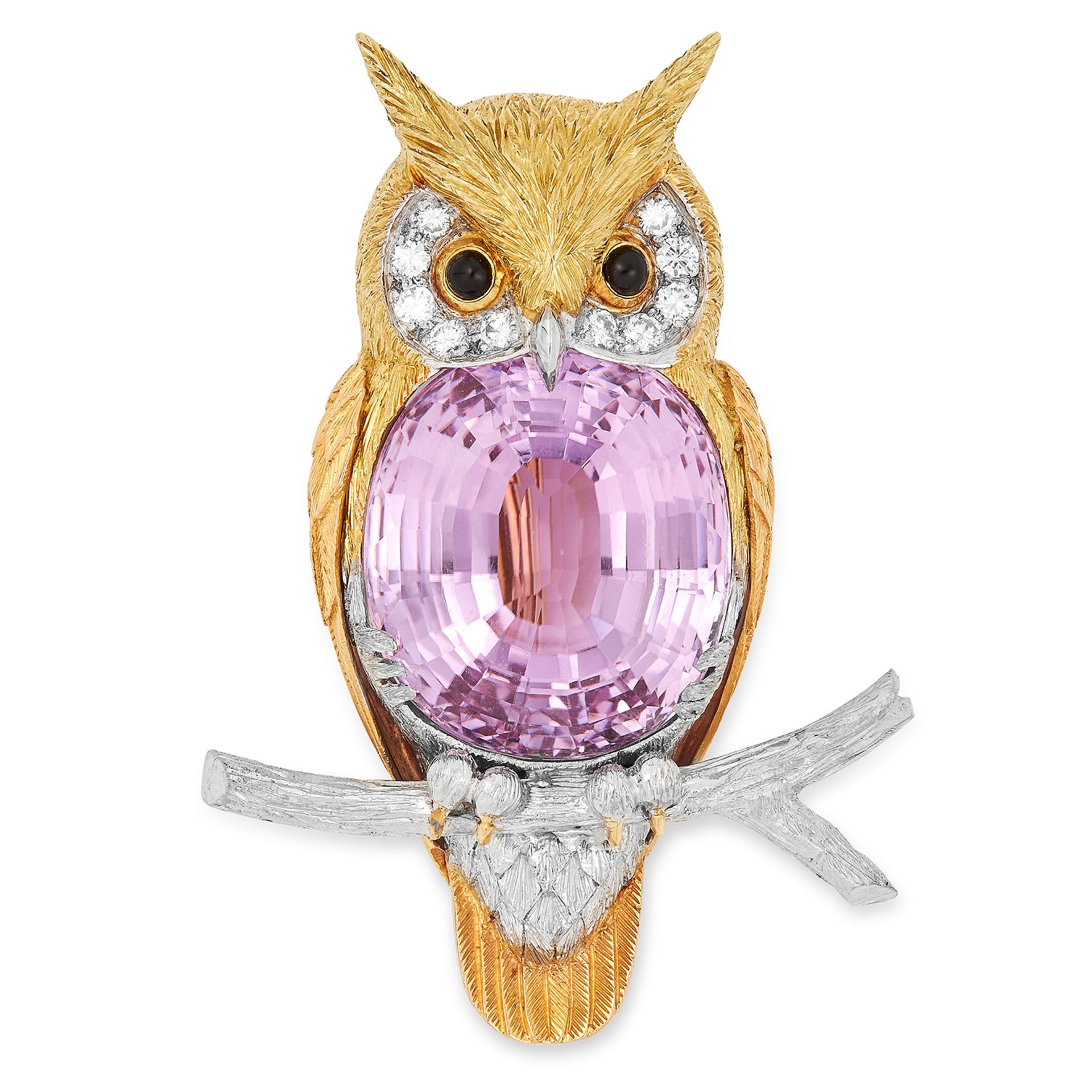 A KUNZITE, DIAMOND AND ONYX OWL BROOCH, 1975 designed as an owl, set with an oval cut kunzite of