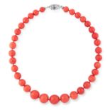 A CORAL BEAD AND SAPPHIRE NECKLACE comprising a single row of thirty-four coral beads ranging 8.8-