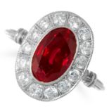 A RUBY AND DIAMOND CLUSTER RING, set with an oval cut ruby and round cut diamonds, size: N / 6.5,