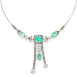 AN ANTIQUE EDWARDIAN EMERALD AND DIAMOND PENDANT in foliate design, set with oval and emerald cut