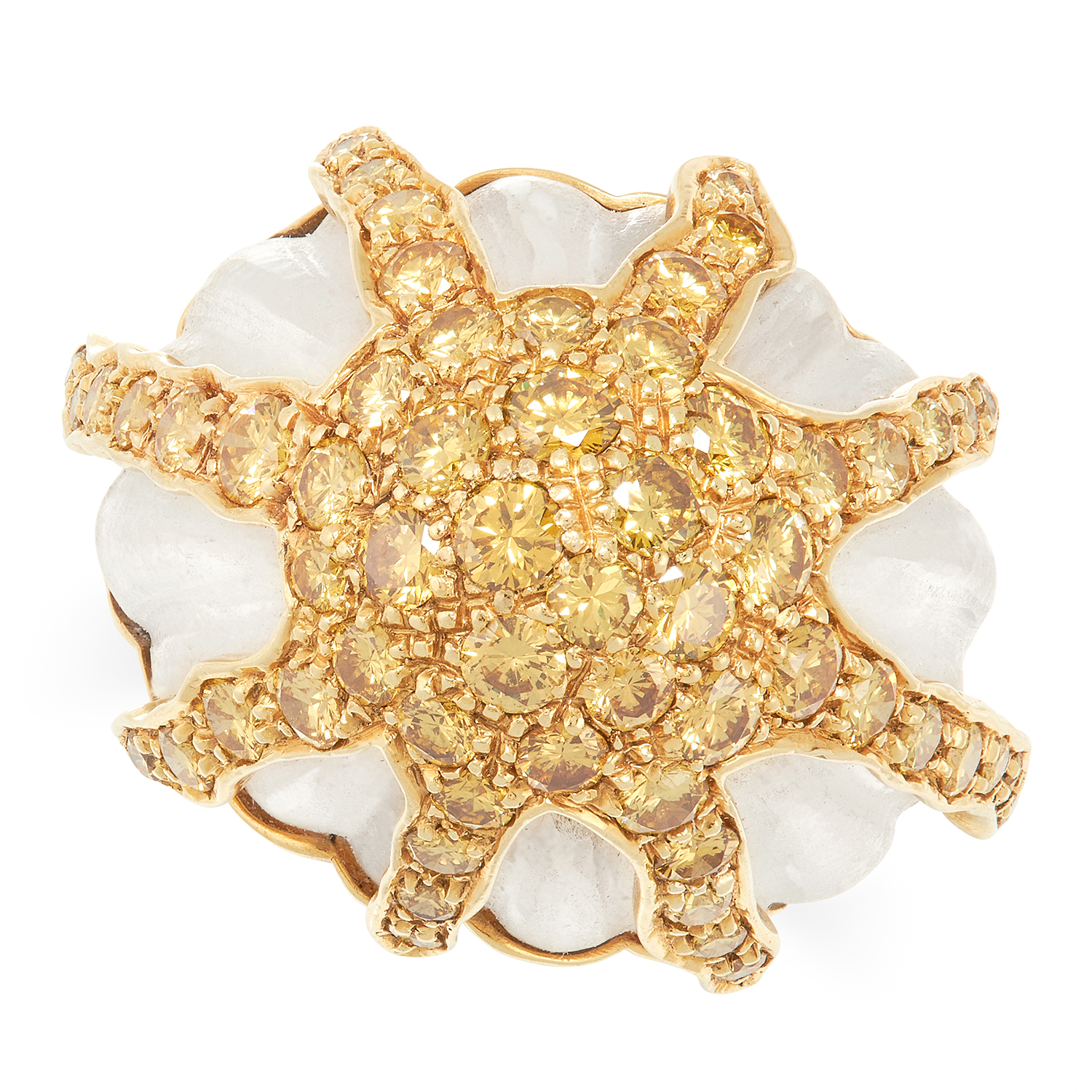 A YELLOW DIAMOND AND ROCK CRYSTAL RING designed as a lobed carved piece of rock crystal with frosted