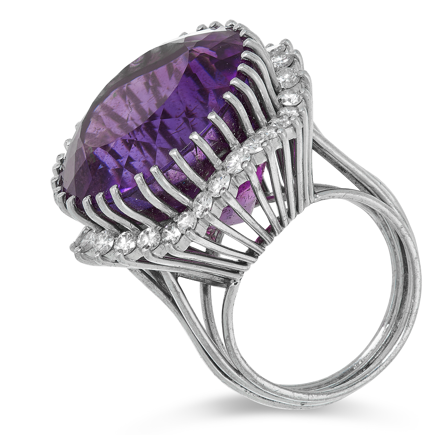 AN AMETHYST AND DIAMOND RING set with a large, round cut amethyst of 41.42 carats encircled by a - Image 2 of 2